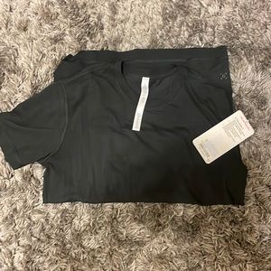 Brand new with tags Lululemon 5 year basic t shirt in black color